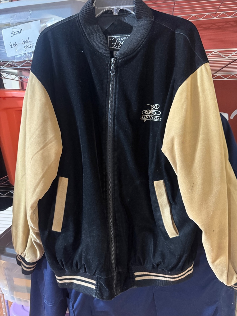Velvety soft fully lined Las Vegas Black and Tan Varsity Bomber Jacket